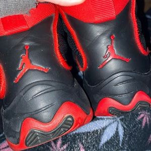 Jordan’s red and black size 7 in womens